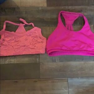Two dance tops in pink size large and medium